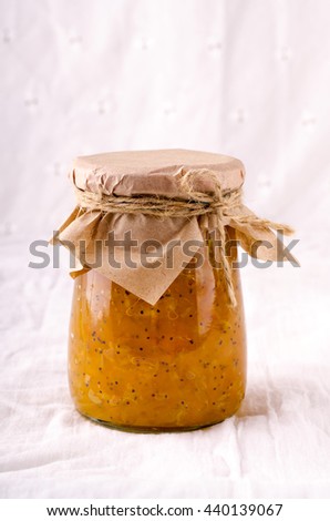 Pumpkin-Orange-Ginger-Poppy seed homemade jam on white background