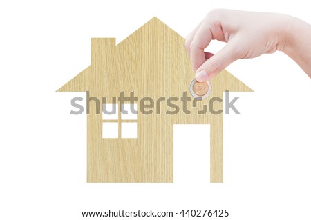 Coin Hand holding house icon in nature as symbol of mortgage,Dream house on nature background, isolated on white background