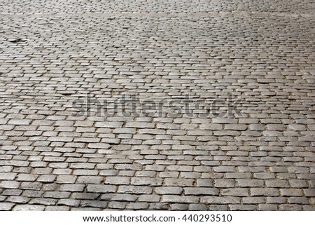 Stone pavers in the street Royalty-Free Stock Photo #440293510