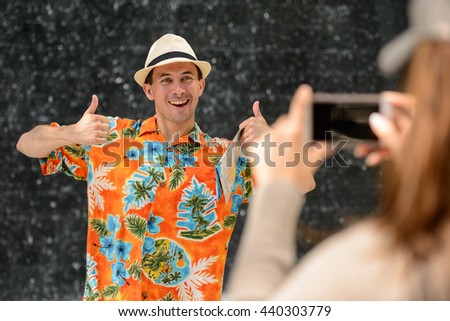 Tourist man posing for camera