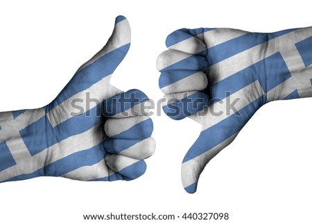Greek flag on human male thumb up and down hands