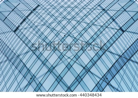 Double exposure photo of structured all-over glazing windows as a sample of modern glass architecture.