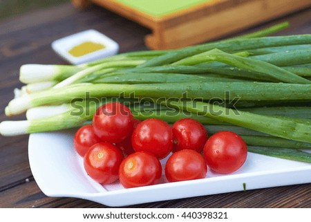 cherry tomatoes and green onions
