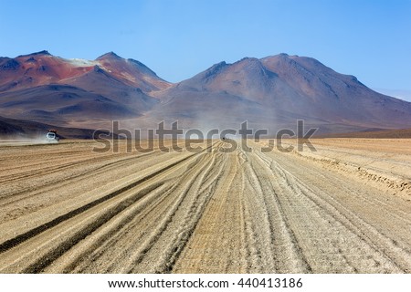 Desert plateau of the Altiplano near Laguna Verde (destroyed cone of an ancient volcano in the background) - Bolivia, South America