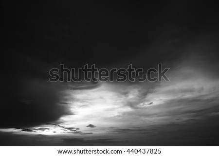 Black and white picture. Black Rain Clouds in the sky.
