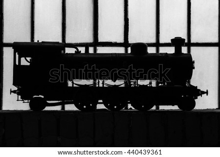 BRATISLAVA,SLOVAKIA - MAY 21, 2016:  Silhouette of a stem engine model. An interior shot in the Museum of Transport, Bratislava, Slovakia, on the Long Night of Museums