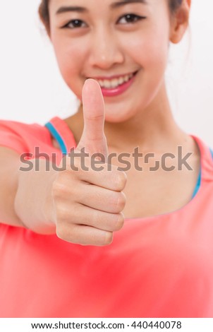 Close Up Woman Shows Thumb Up.