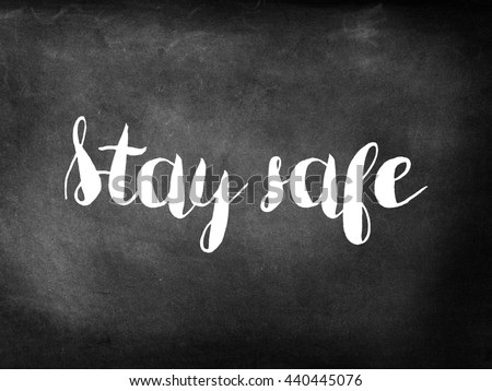 Stay safe written on chalkboard Royalty-Free Stock Photo #440445076