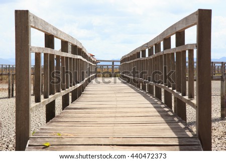 closeup wooden railing bridge