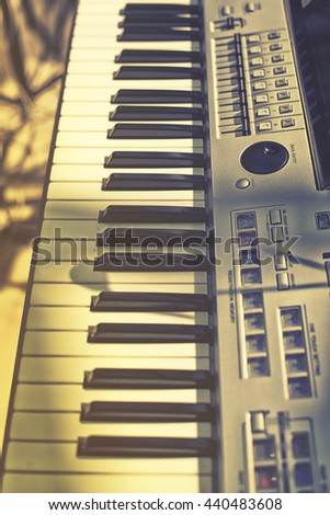 Vintage looking Detail of  keys on music keyboard