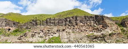 Vardzia cave city-monastery. Vardzia was excavated in the Erusheti Mountain. Banner
