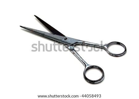 An old scissors isolated on a white background.