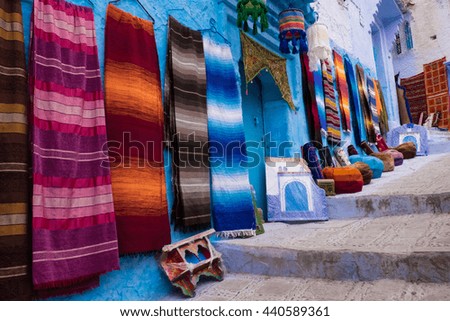 Morocco, Chefchaouen or Chaouen is the chief town of the province of the same name. It is most noted for its small narrow streets and neighborhoods painted in vivid blue colors. Rug/carpet vendor.