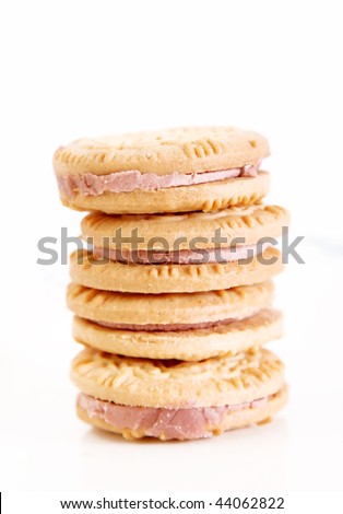 Tower of sweet cookies on a white background