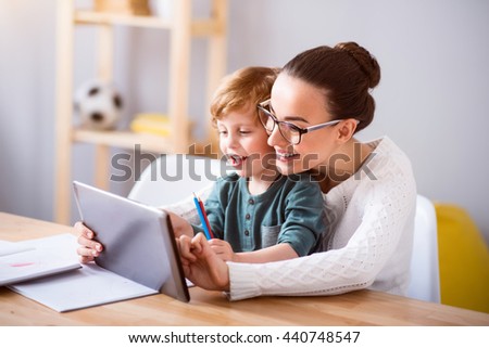 Mother and child using a tablet