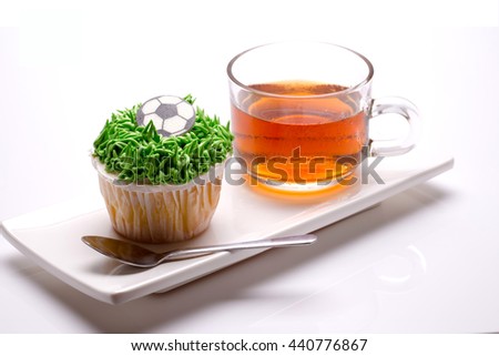 Euro Cupcake with hot tea in Break time on White Background