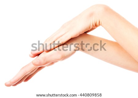 Beautiful woman's hands on the white background