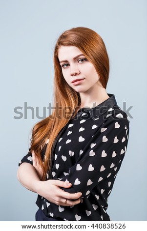 Young woman with crossed hands
