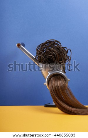 meat grinder with hair.funny picture still life.hair care