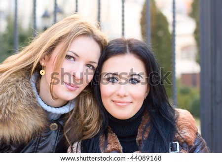 Two of cute young girls outdoor