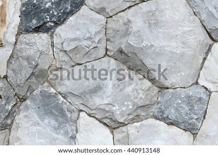 Background and texture of stone wall with seamless pattern.