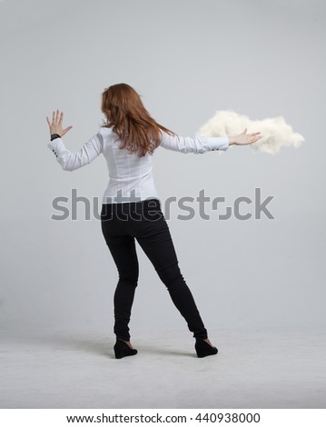 Young woman and cloud, cloud computing concept