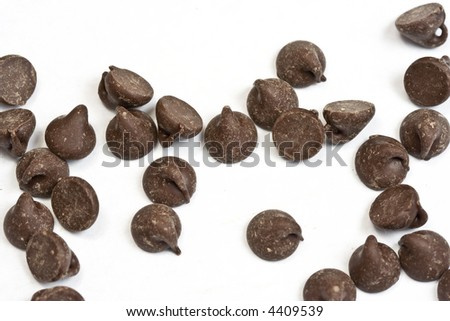 tasty chocolate chips on a white background Royalty-Free Stock Photo #4409539