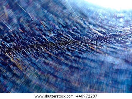 Abstract blue background from a web illuminated by the sun