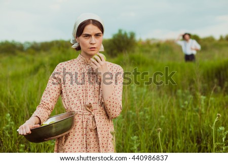 The healthy rural life. The woman in the green field