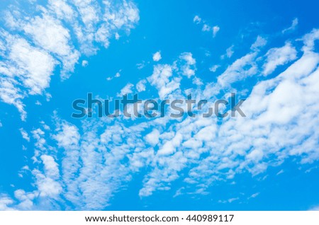 Natural bright blue sky with white altocumulus cloud layer, background photo texture