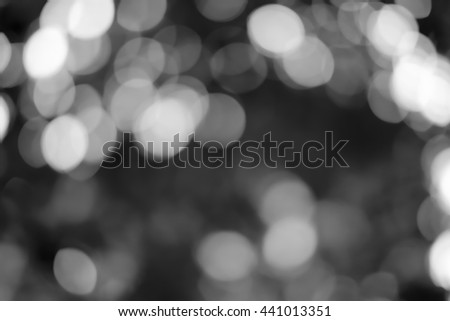 blurred black and white natural background texture. blur back and white concept.blurry dark organic foliage wallpaper conceptual:shadow gray sparkle light backdrop:abstract art of nature tree leaves.
