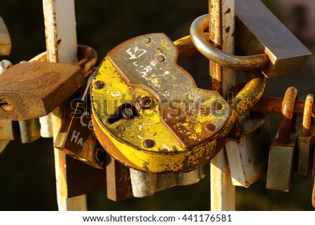 Old lock Key from heart of love, vintage background 