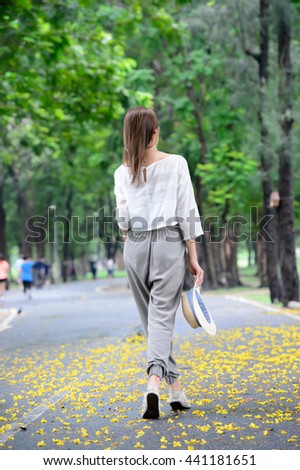 Lady walking in the park