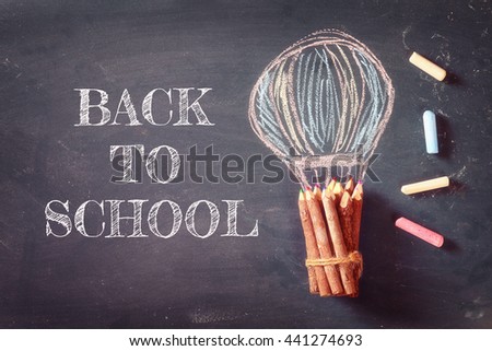 Back to school concept with info graphics sketch on the blackboard