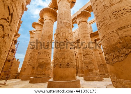 Great Hypostyle Hall and clouds at the Temples of Karnak (ancient Thebes). Luxor, Egypt Royalty-Free Stock Photo #441338173