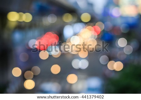 Beautiful night lighting. City fade light blur bokeh. Defocused abstract background.  Royalty-Free Stock Photo #441379402