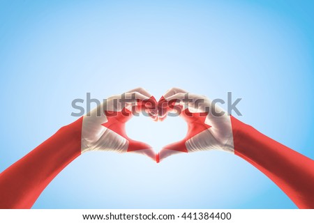 Canada flag pattern Red maple leaf on people hands in heart shape for Canadian public holiday, National Patriots' Day, Civic/Provincial, Labour and Discovery Day  memorial remembrance celebration