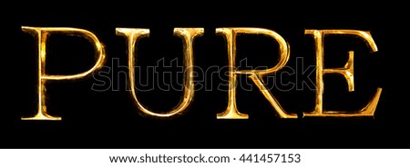 Wooden letters in gold on black background spelling PURE