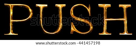 Wooden letters in gold on black background spelling PUSH