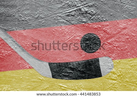 Image of the German flag and hockey puck with the stick on the ice. Concept