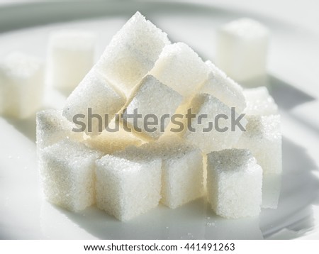 Close up shot of white refinery sugar. Royalty-Free Stock Photo #441491263