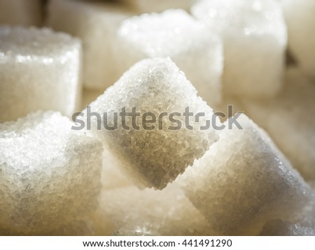 Close up shot of white refinery sugar. Royalty-Free Stock Photo #441491290