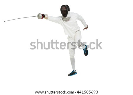 Man wearing fencing suit practicing with sword on white background