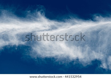 clouds look like a feather and look like a lightning strike