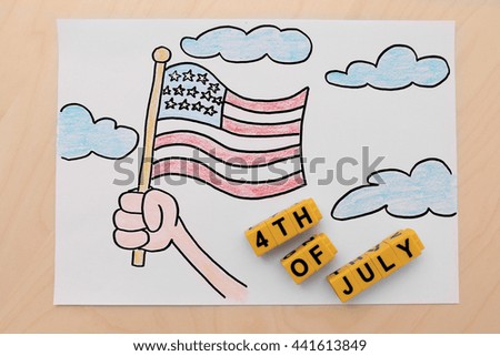 Child's drawing of American flag on paper