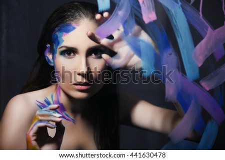 girl in colorful paints