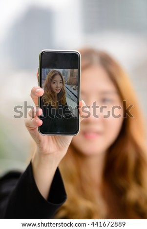 Phone selfie outdoors
