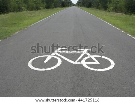  bicycles sign on a road                         