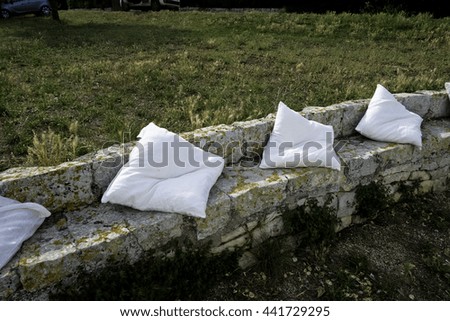 White pillows as outdoor furniture vacation villa.