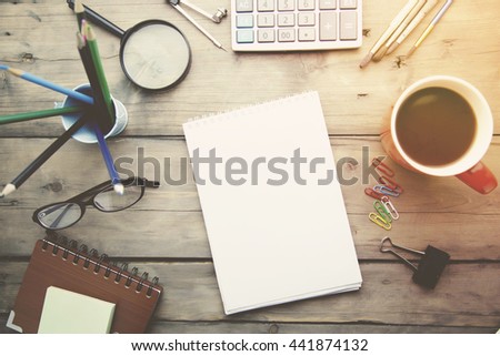 different stationery on the wooden table